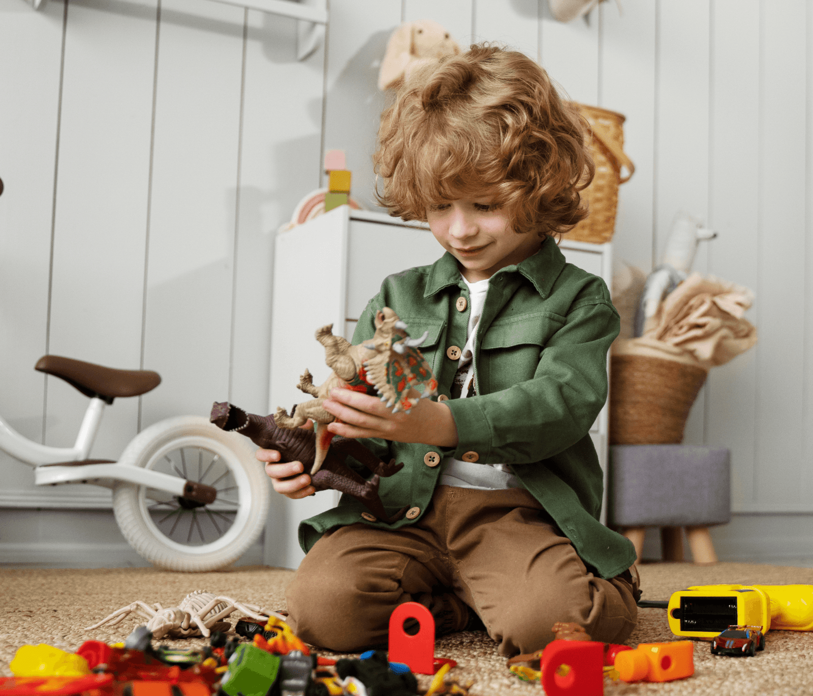 Boy holding toy